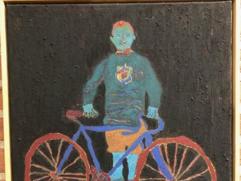 Maleri af mand med cykel på sort baggrund. 