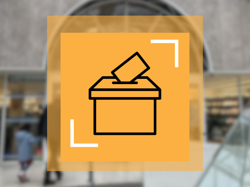 Grafik der forestiller en stemmekasse på biblioteket